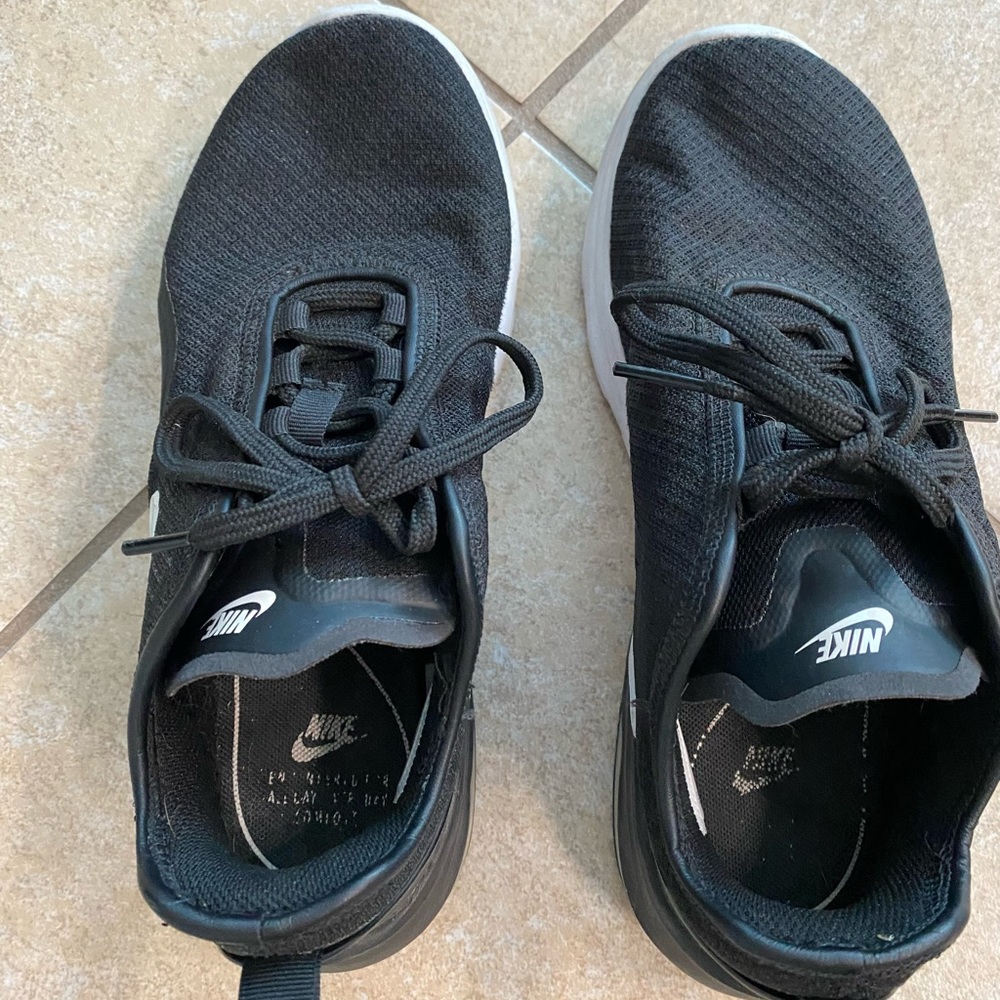 Black Nike athletic shoes